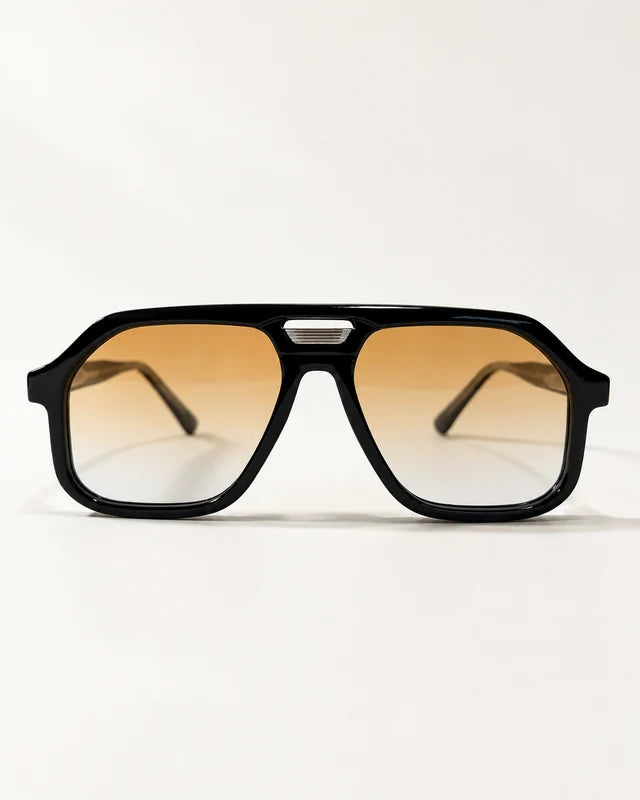 AUR-002 C3, black / amber gradient, front view.