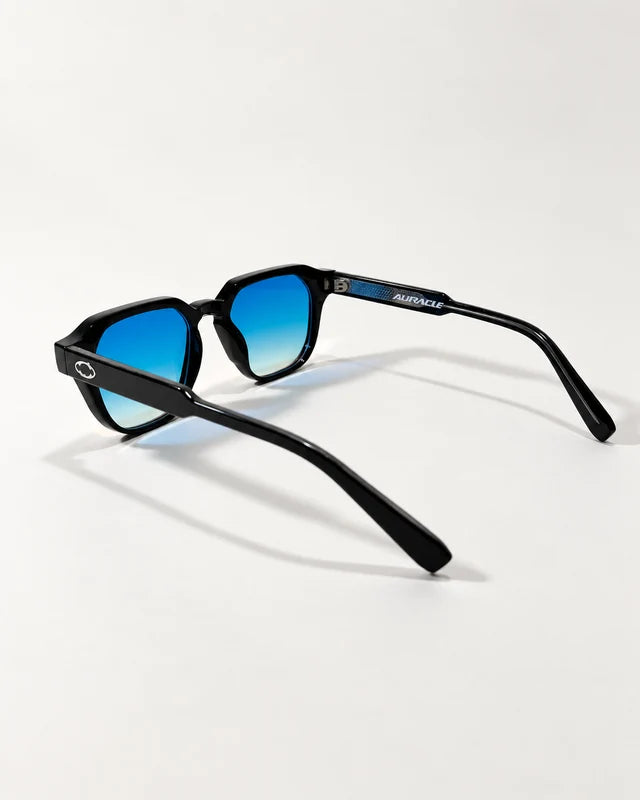 AUR-001 C6, black / pink mirror, rear three-quarter view. Blue reverse of the same pink flash-mirror pair.